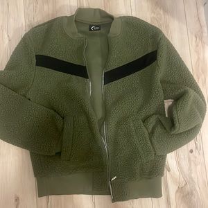 Dark green fleece jacket.
